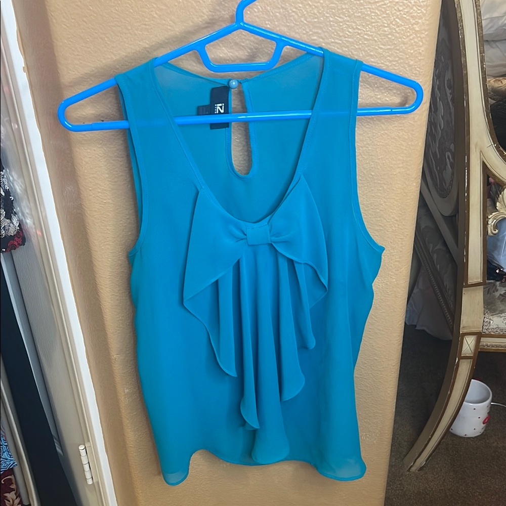 Blue Sleeveless Bow Front Blouse